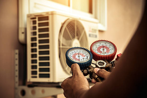 Professional Heat Pump Repair technician working in Hamptonville, NC